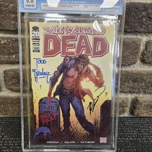 THE WALKING DEAD SIGNED COMIC - GRADED 9.8 - LG33237